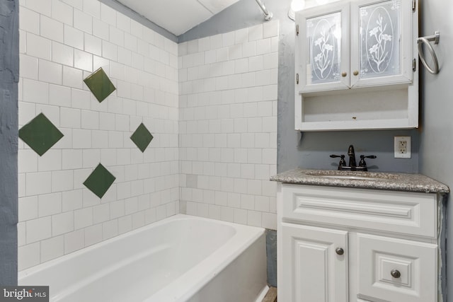 bathroom with shower / bath combination and vanity