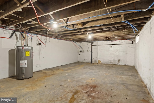 unfinished basement with electric water heater