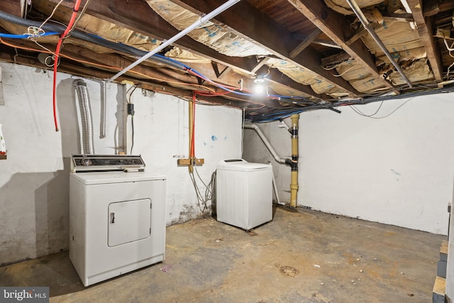 unfinished below grade area with separate washer and dryer