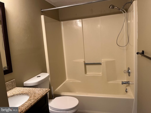 full bathroom with shower / bathtub combination, vanity, and toilet