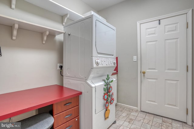 laundry room with stacked washer / dryer