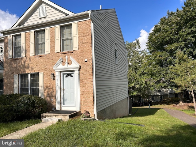 view of front of home with a front yard