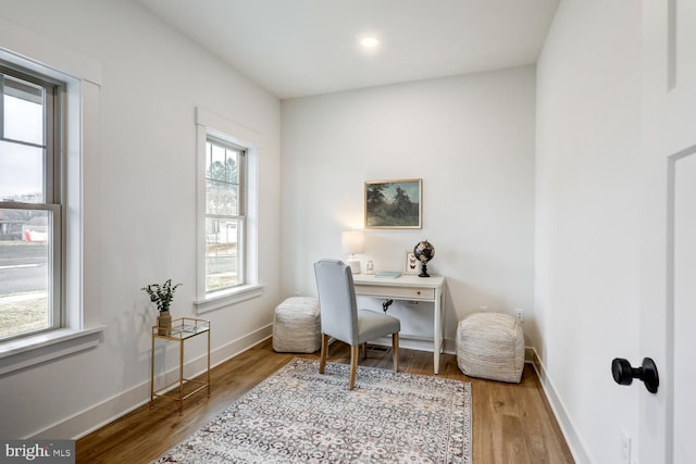 office area with hardwood / wood-style floors