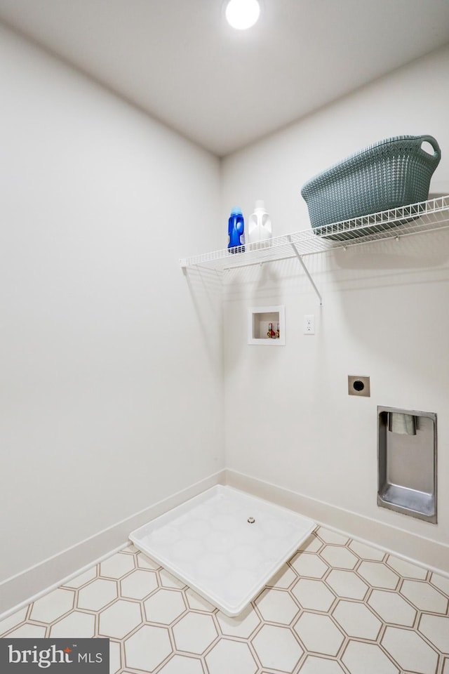 laundry room with electric dryer hookup and washer hookup