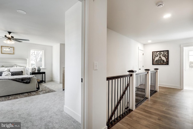 corridor featuring hardwood / wood-style floors