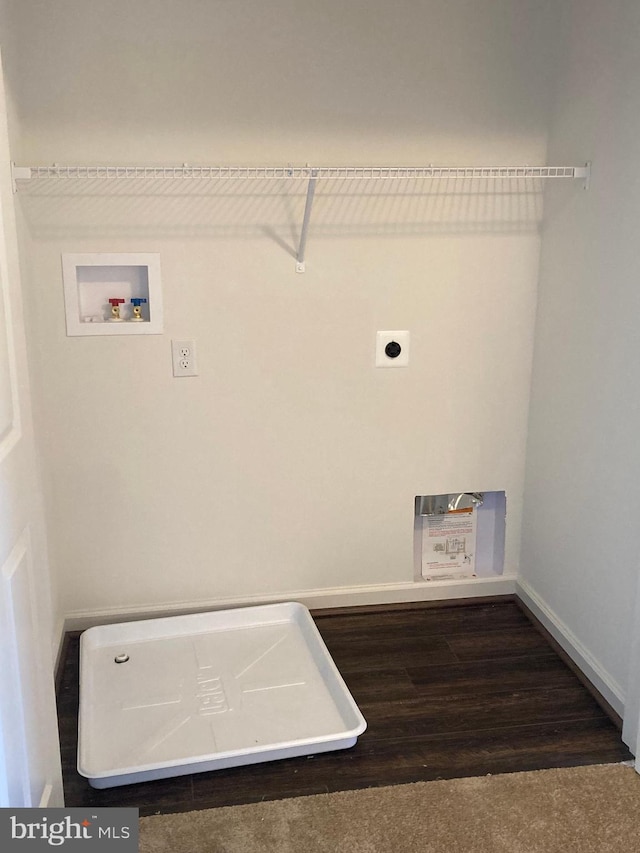 clothes washing area featuring hookup for a washing machine and electric dryer hookup