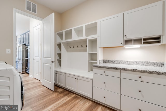 interior space with light hardwood / wood-style floors