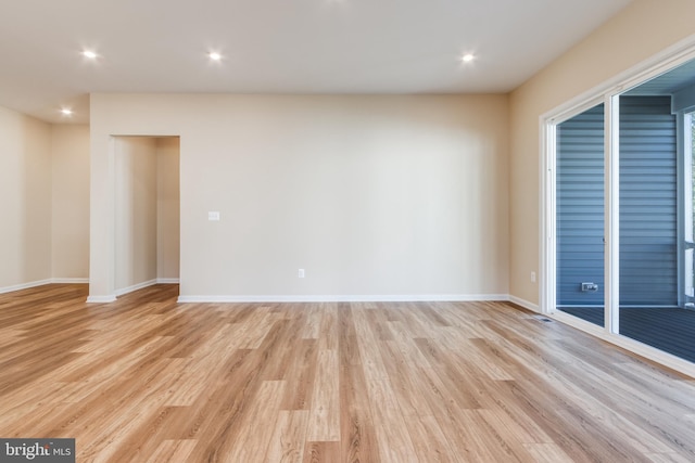 empty room featuring light hardwood / wood-style floors