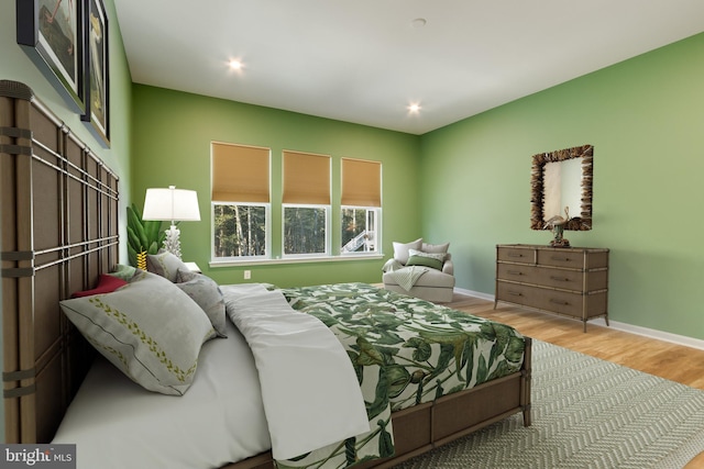 bedroom with light wood-type flooring