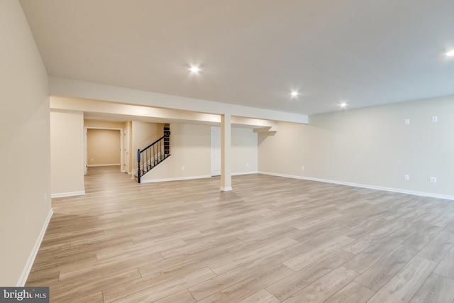 basement featuring light wood-type flooring