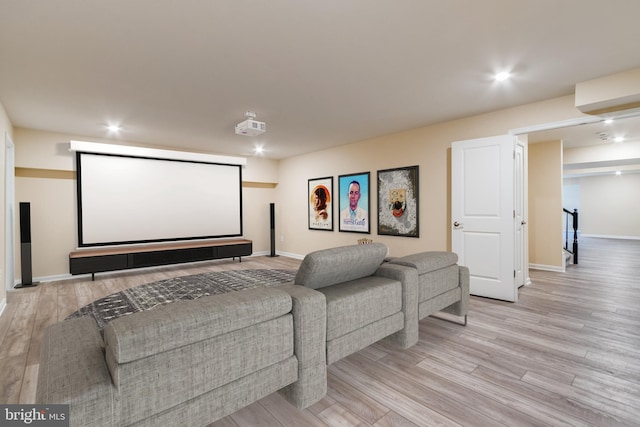 home theater with light hardwood / wood-style floors