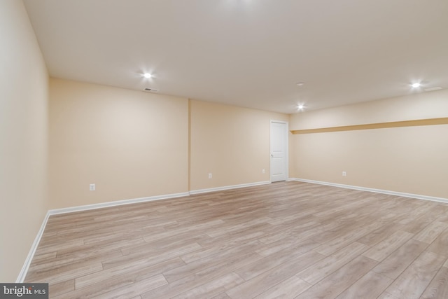 unfurnished room featuring light hardwood / wood-style flooring