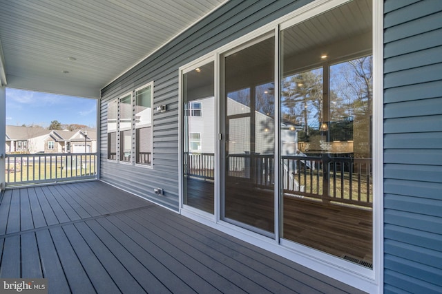 wooden terrace featuring a porch