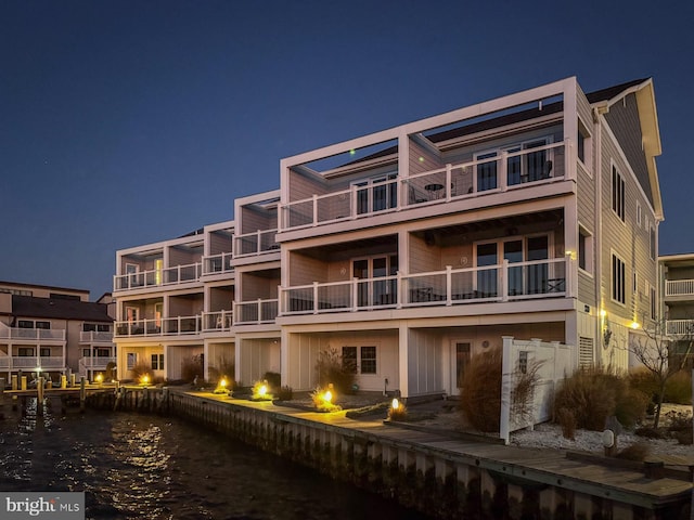 view of building exterior with a water view