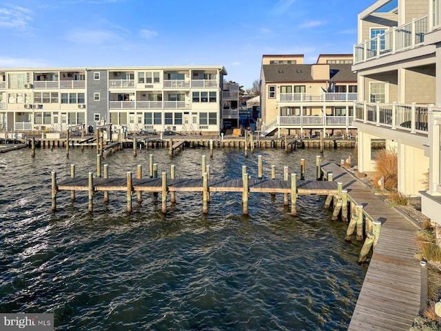 dock area featuring a water view