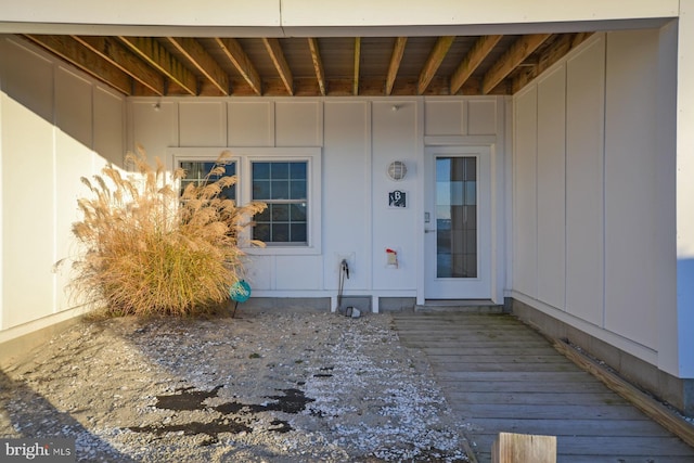 doorway to property with a wooden deck