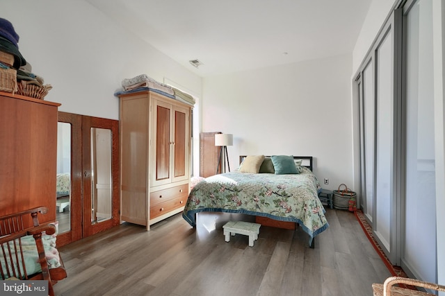 bedroom featuring hardwood / wood-style floors