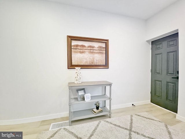 foyer with light hardwood / wood-style flooring