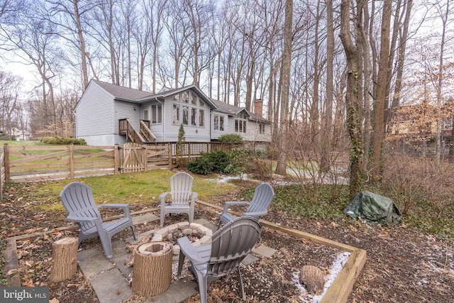 view of yard with an outdoor fire pit