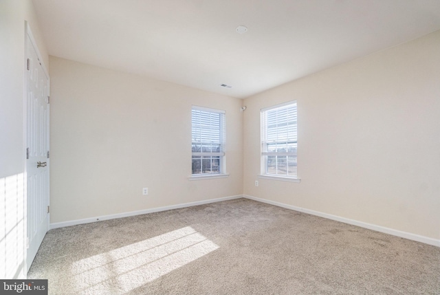 empty room with carpet floors