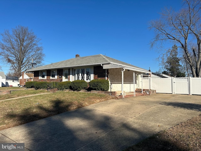 view of property exterior with a lawn