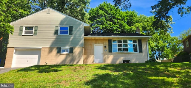 6130 Pine Knoll Dr, Harrisburg, PA 17111 - split level home featuring brick siding, a front yard, a garage, and a chimney