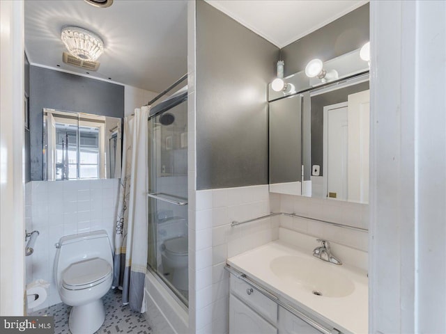 full bathroom with shower / bath combo, vanity, tile patterned flooring, toilet, and tile walls