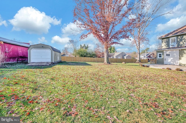 view of yard with a patio area and an outbuilding