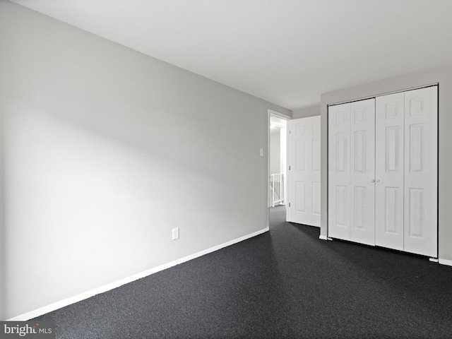 unfurnished bedroom featuring a closet