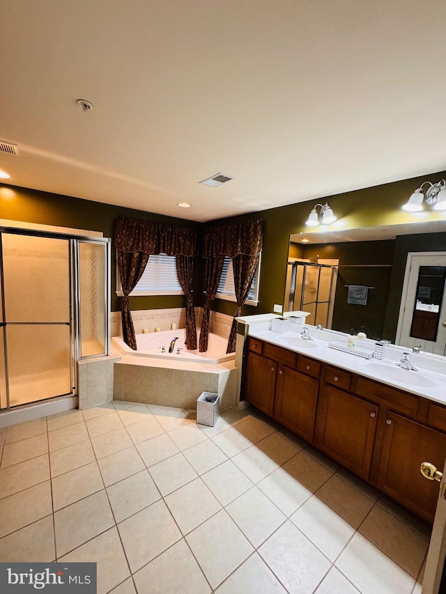 bathroom with vanity, tile patterned floors, and separate shower and tub