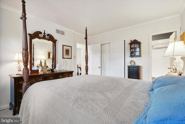 bedroom featuring a closet, carpet, and ornamental molding