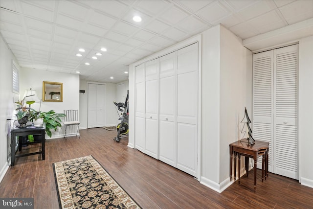 hallway featuring dark hardwood / wood-style floors