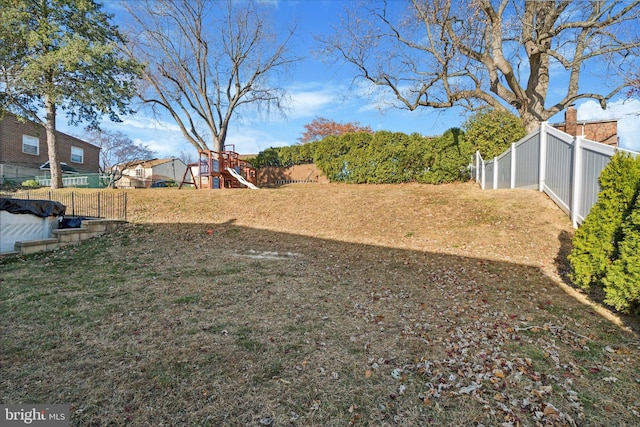 view of yard with a playground