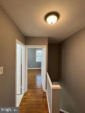 hall featuring dark hardwood / wood-style flooring