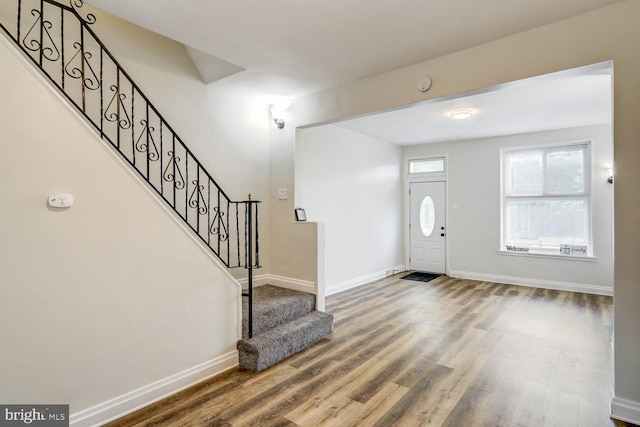 entrance foyer featuring hardwood / wood-style flooring