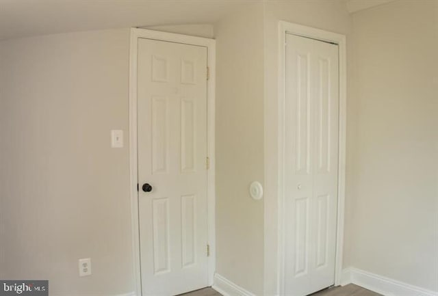 unfurnished bedroom with a closet