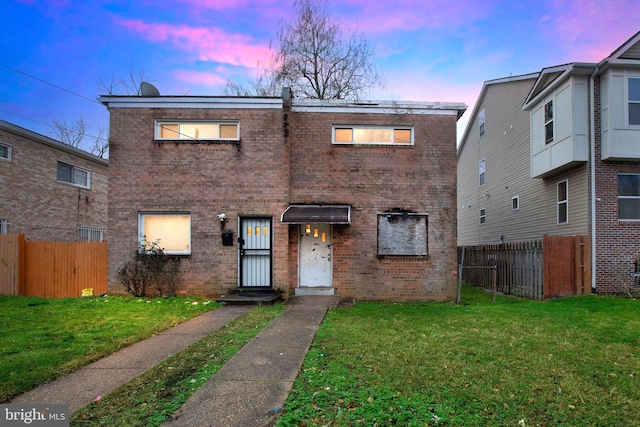 view of property with a lawn