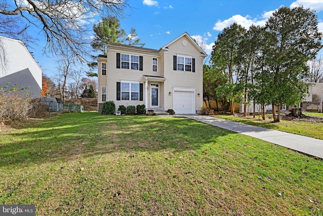 view of front property with a front yard and a garage