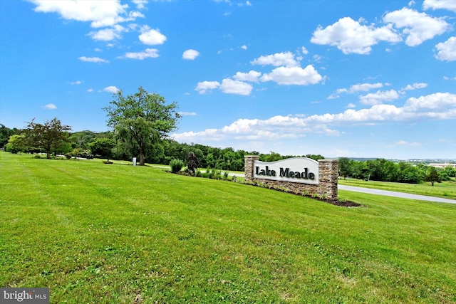 exterior space featuring a yard and a rural view