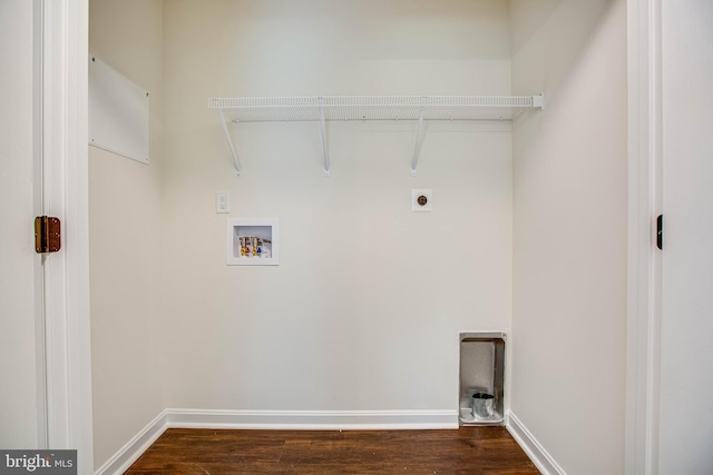 washroom featuring hookup for an electric dryer, washer hookup, and dark hardwood / wood-style floors