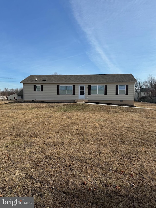 view of front of property with crawl space and a front yard