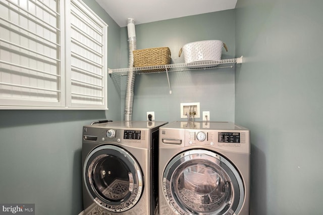 washroom featuring independent washer and dryer