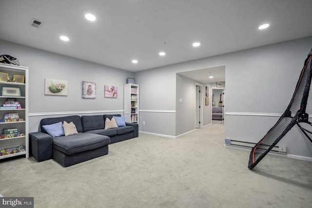 living room with light carpet and a baseboard heating unit