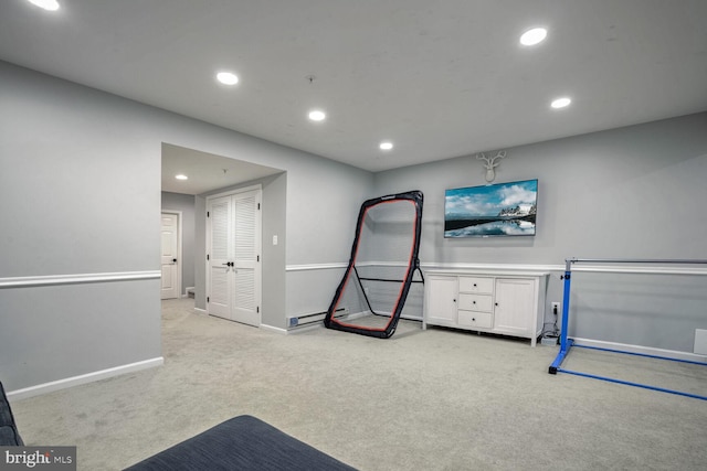 game room featuring light carpet