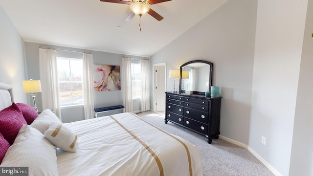 bedroom with light carpet, vaulted ceiling, and ceiling fan