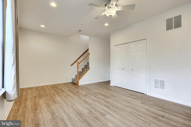 interior space featuring light hardwood / wood-style flooring and ceiling fan