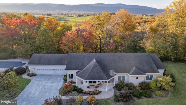 drone / aerial view with a mountain view