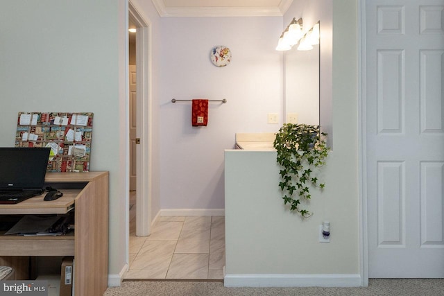 bathroom with ornamental molding