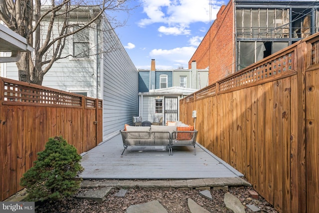 wooden deck with an outdoor hangout area