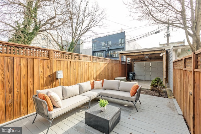 wooden terrace with an outdoor hangout area